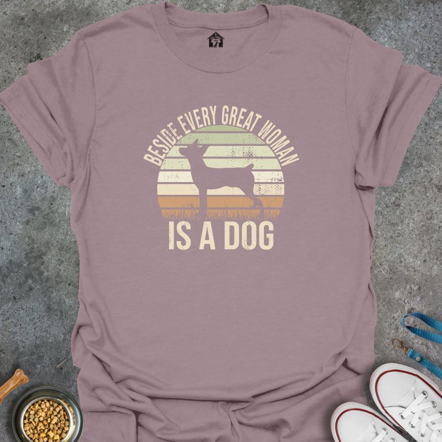 Beside Every Great Woman is a Dog